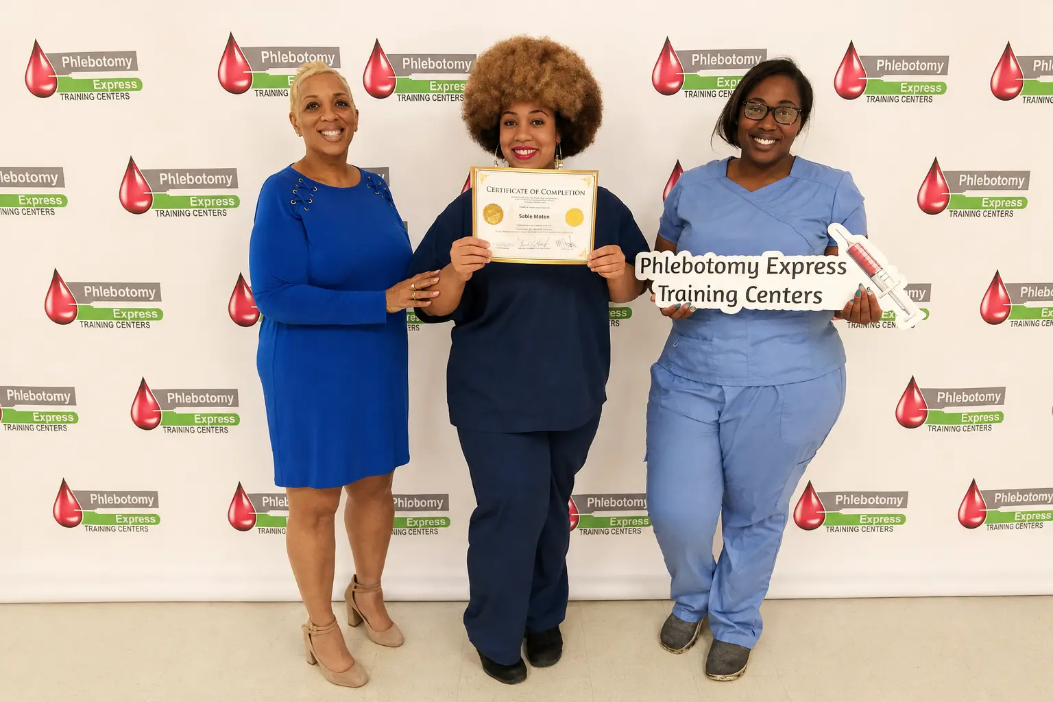 PETC student celebrating completion of an in-person training program with school supporters
