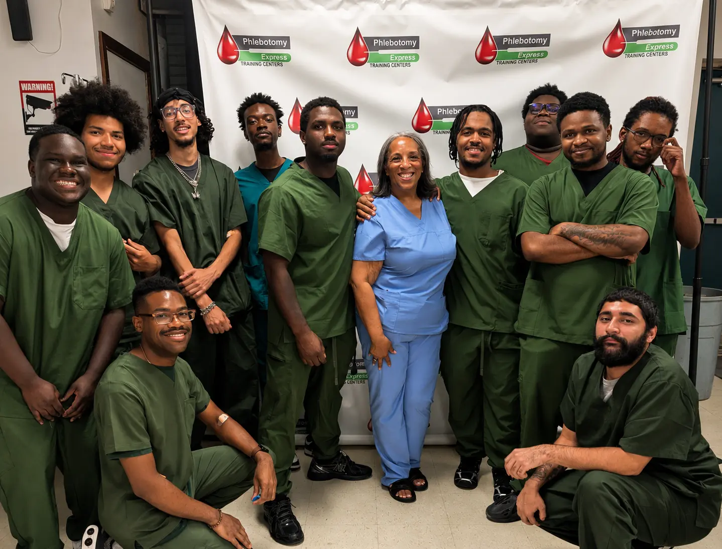 PETC students and instructor gathered after an in-person healthcare training session in Detroit